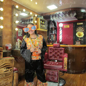 Hippy blusa naranja flores y pantalon negro